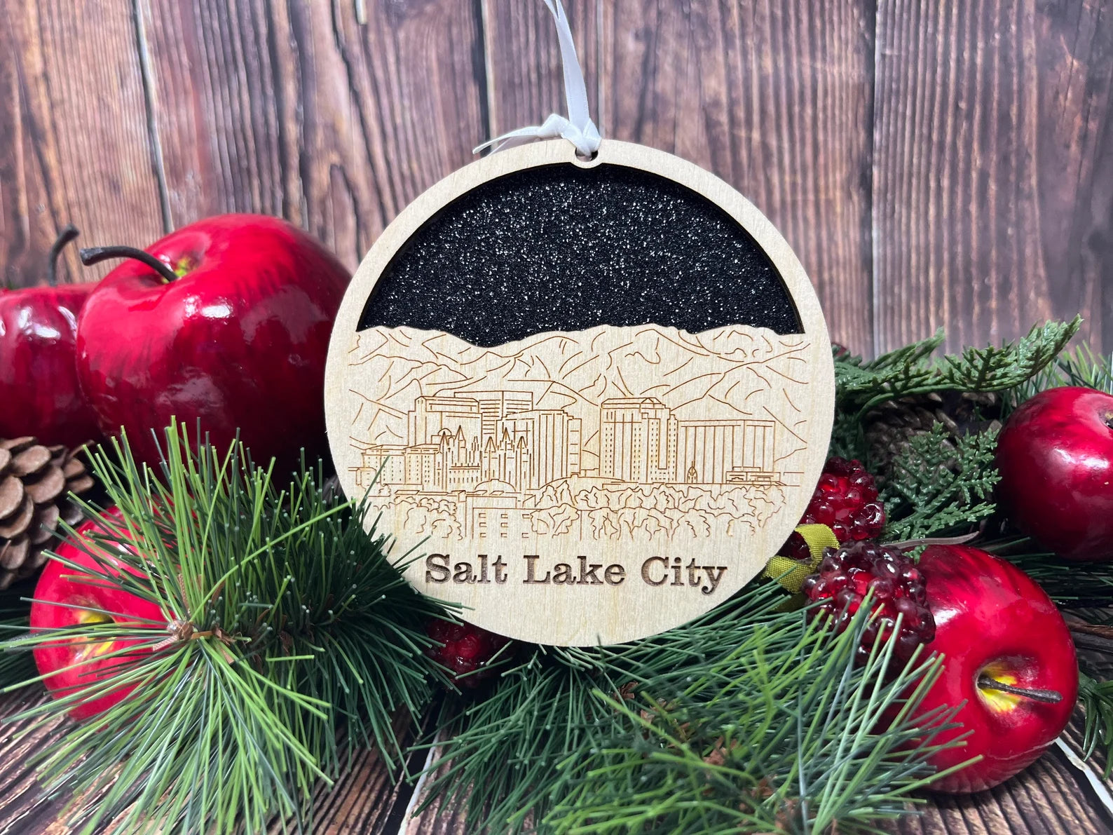 A beautifully crafted Salt Lake City skyline ornament made from premium Baltic birch wood, showcasing intricate skyline details.