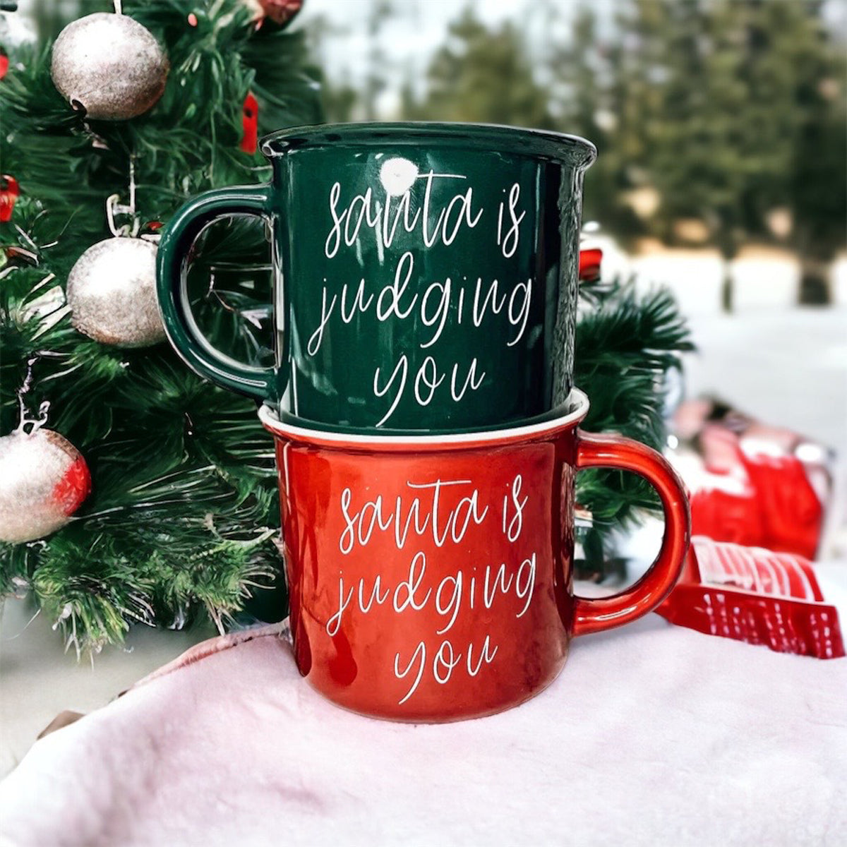 A festive ceramic mug featuring a humorous Santa design, available in red or green, perfect for holiday beverages.