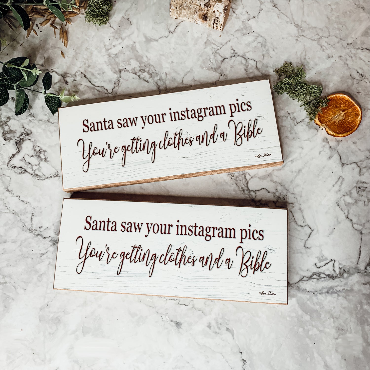 A humorous wooden sign reading 'Santa Seen Your Instagram & He’s Getting You Clothes & a Bible', perfect for holiday decor.