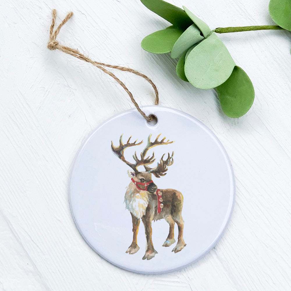 A beautifully crafted porcelain ornament featuring Santa's Reindeer design, perfect for holiday decor.