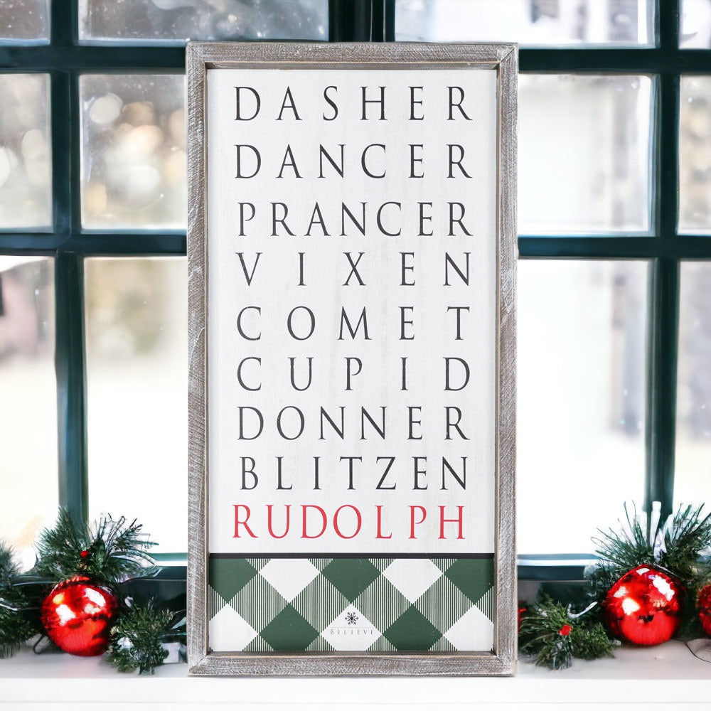 Santa's Reindeer Sign featuring names of reindeer with Rudolph's name in red and a classic plaid design.