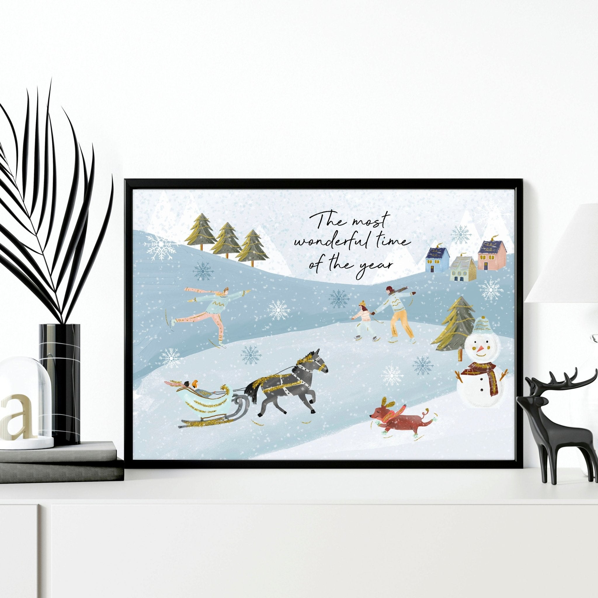 A beautiful Scandi Christmas decor wall art print featuring a serene watercolour landscape with snowy mountains and festive activities.