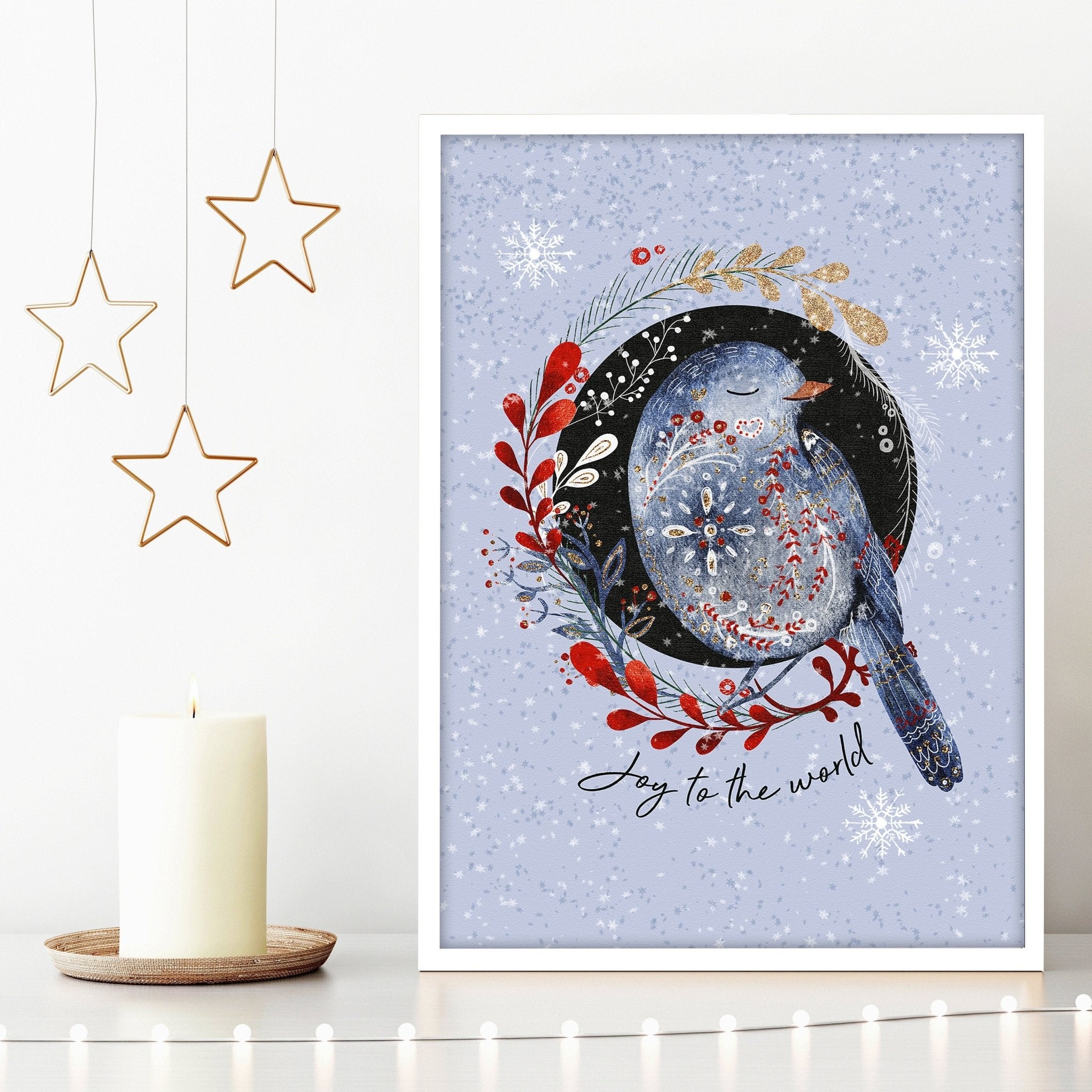 Scandi Christmas wall art print featuring a wreath with folk-style birds on a light blue snowed background.