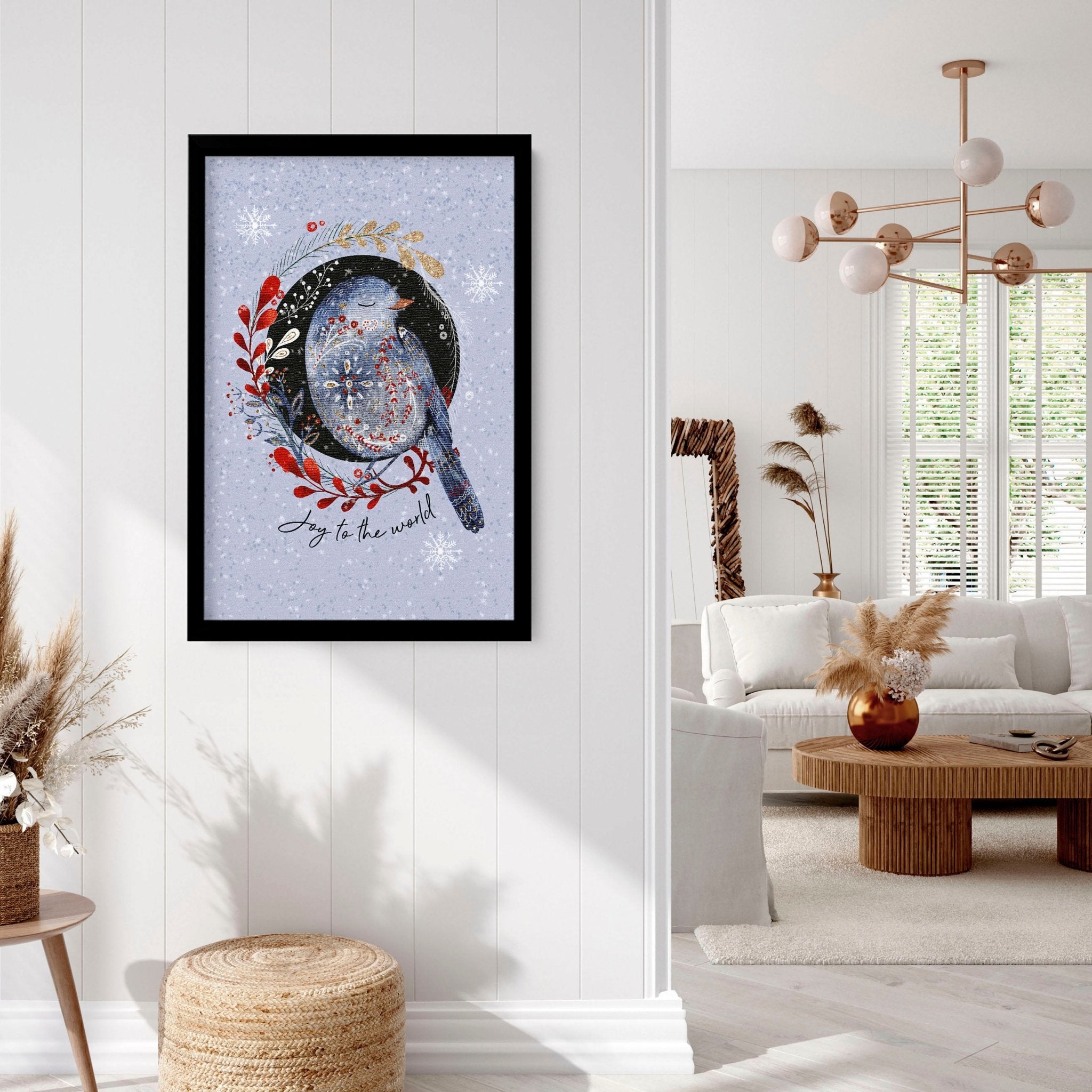 Scandi Christmas wall art print featuring a wreath with folk-style birds on a light blue snowed background.