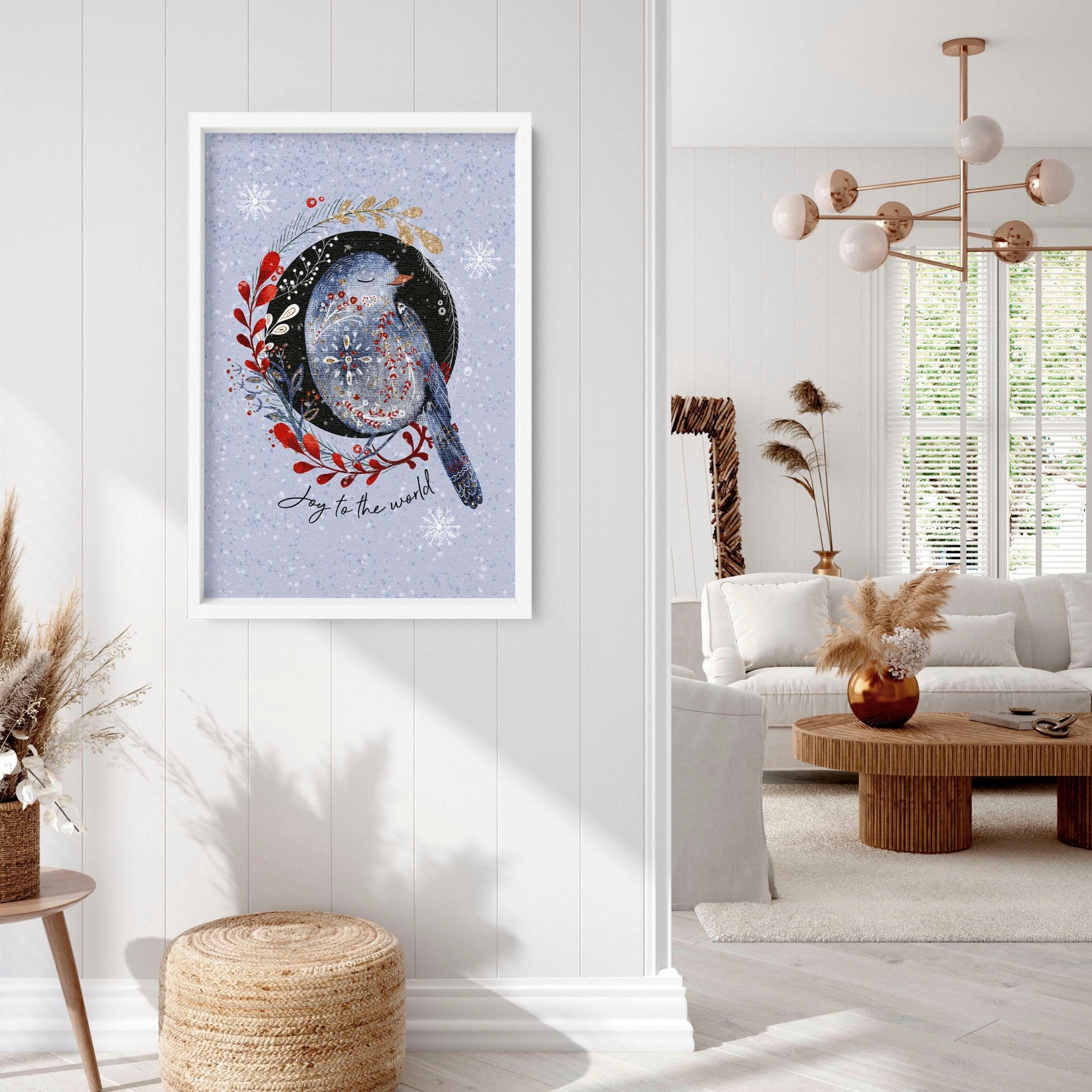 Scandi Christmas wall art print featuring a wreath with folk-style birds on a light blue snowed background.