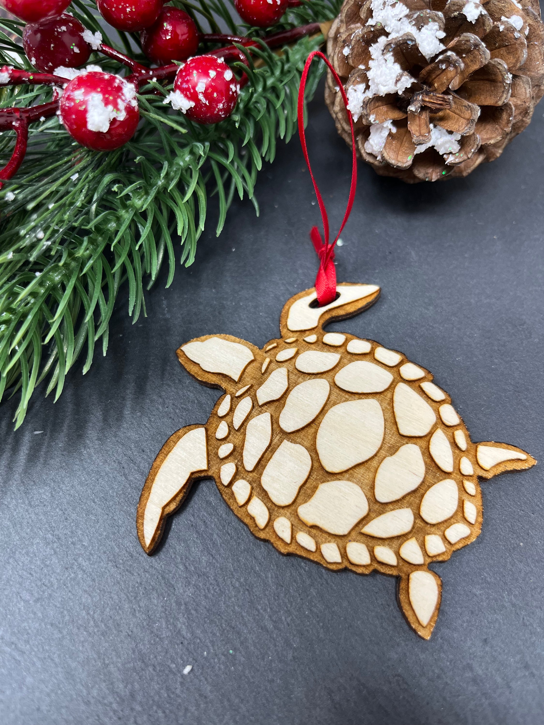 A beautifully crafted Sea Turtle ornament made from premium Baltic Birch wood, showcasing intricate laser-cut details.