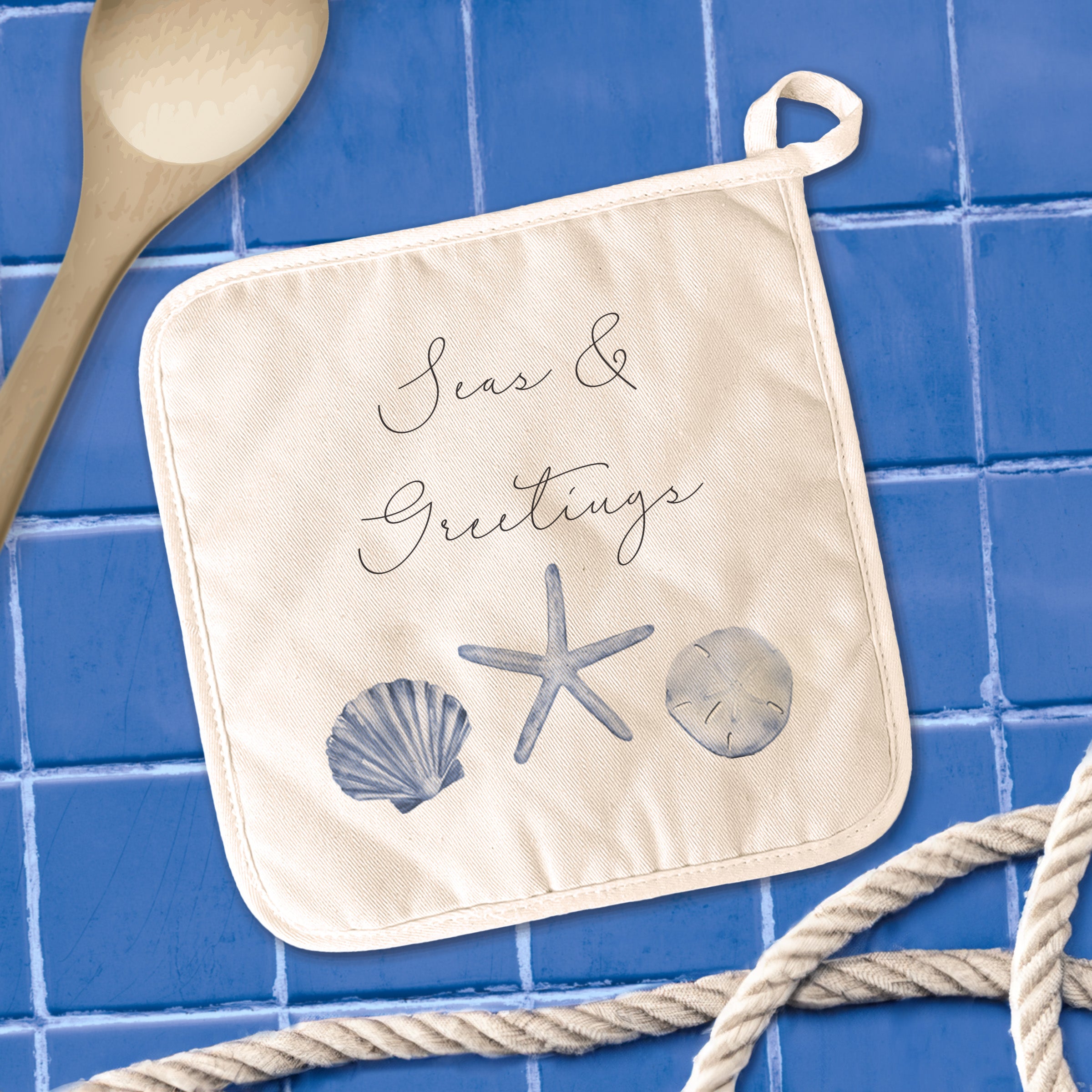 Seas & Greetings Cotton Pot Holder featuring vibrant designs and a convenient hanging loop, perfect for protecting surfaces from hot cookware.