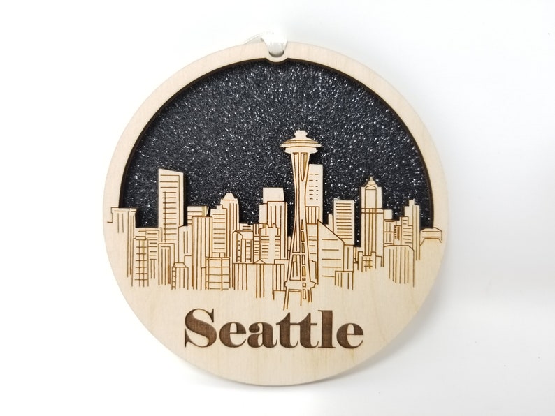 Seattle Skyline Ornament made from premium Baltic birch wood, showcasing the iconic skyline design.