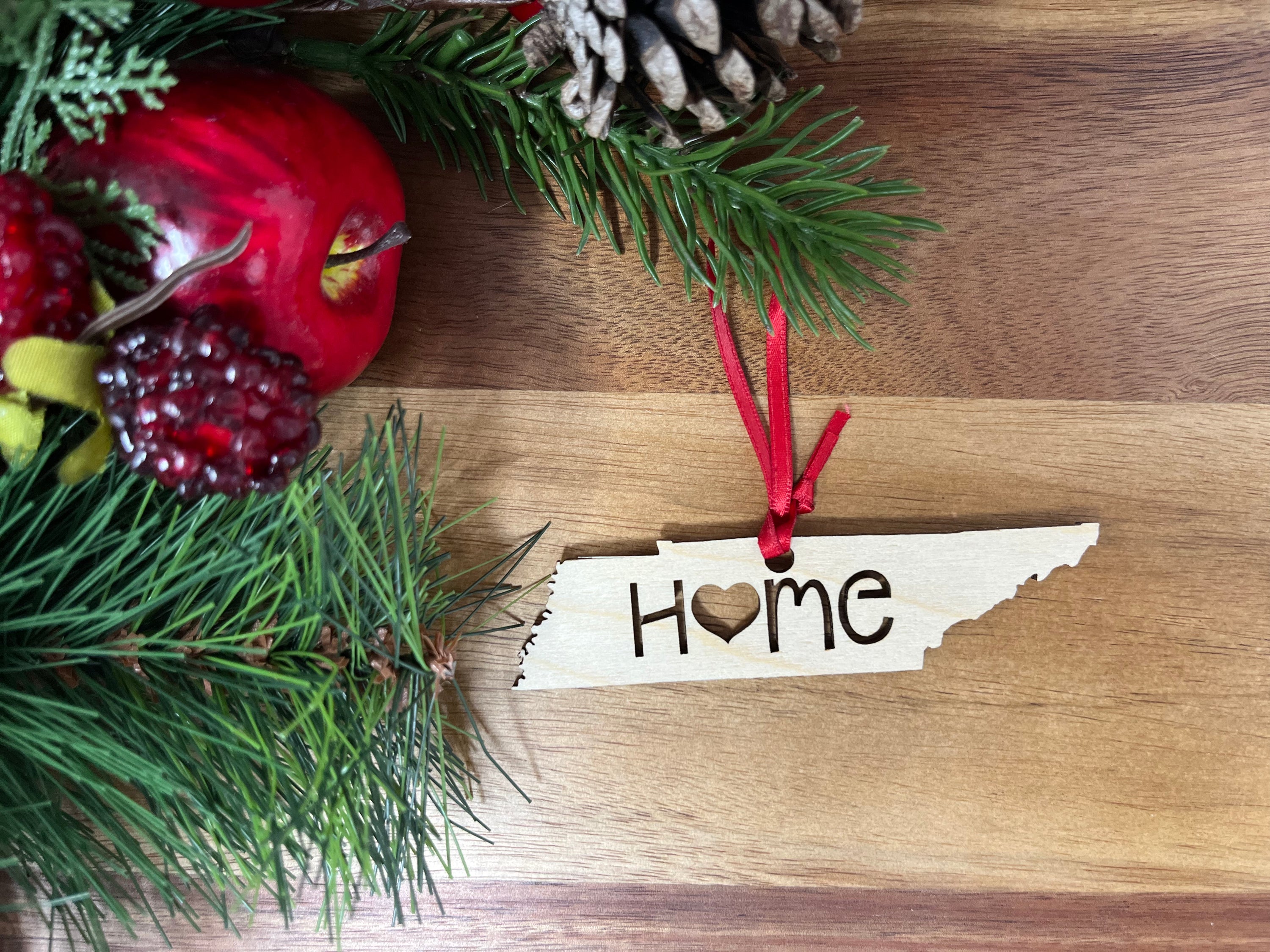 Tennessee State Wood Christmas Ornament made from Baltic Birch, showcasing intricate design and natural finish.