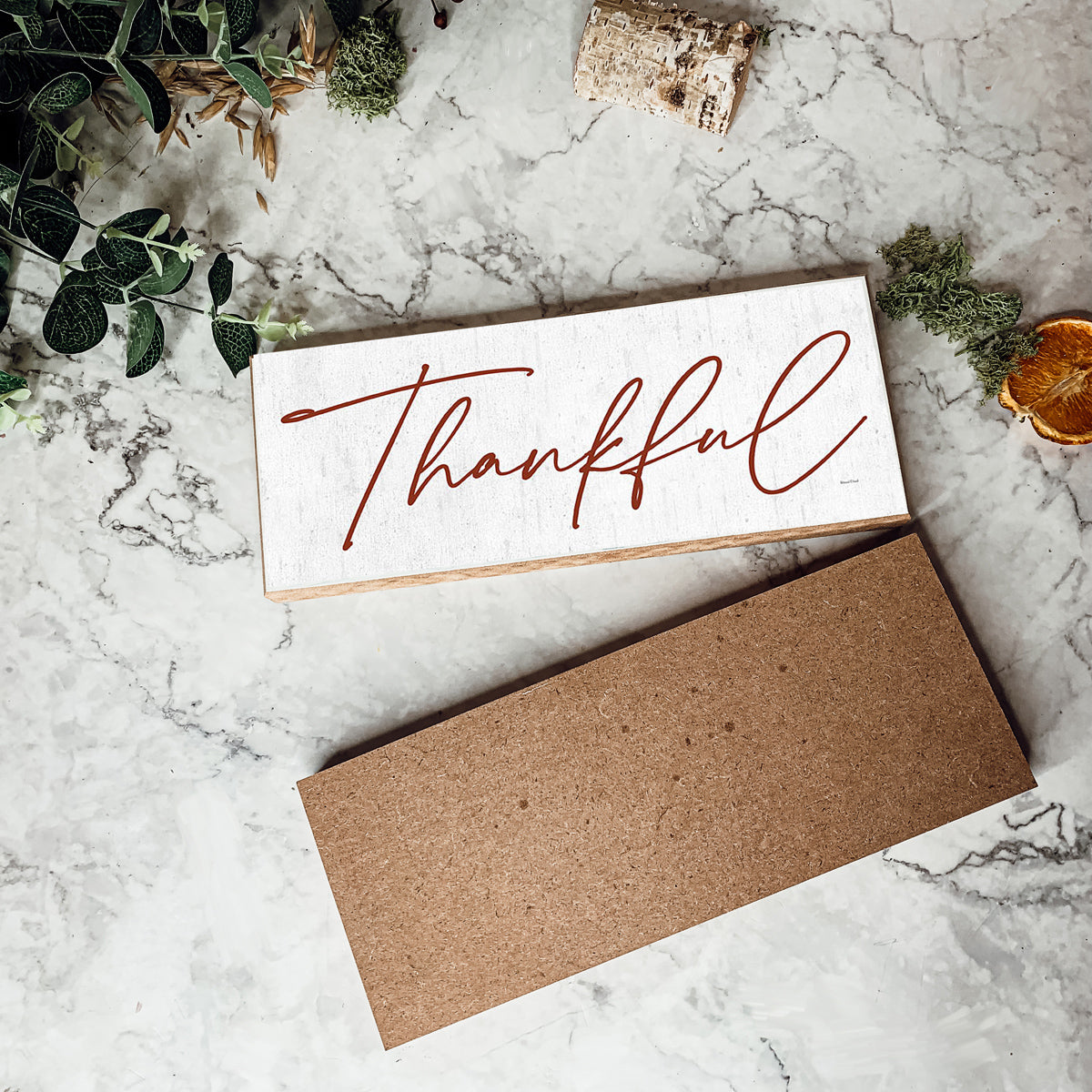 Two rustic wooden signs with 'Give Thanks' and 'Thankful' in elegant script, perfect for home decor.