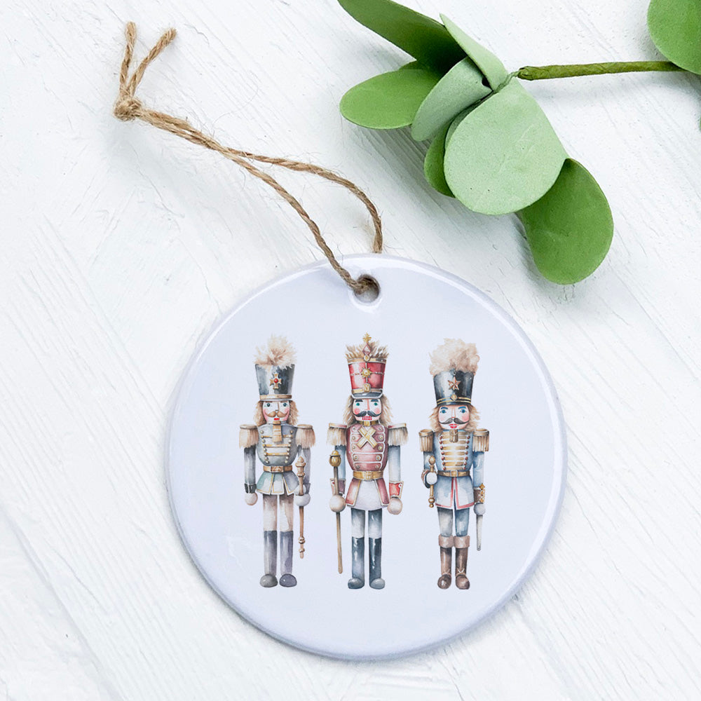 Three Nutcrackers Ornament made of high-quality porcelain with vibrant colors and intricate designs, perfect for holiday decor.