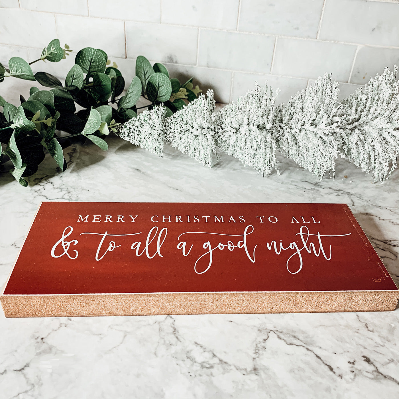 Handmade wooden sign featuring the phrase 'To All a Good Night', perfect for holiday decor.