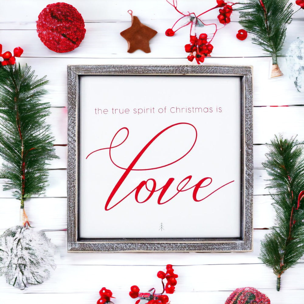 True Spirit 10" Sign with wood frame and embossed design featuring the message 'The True Spirit Of Christmas Is Love'.