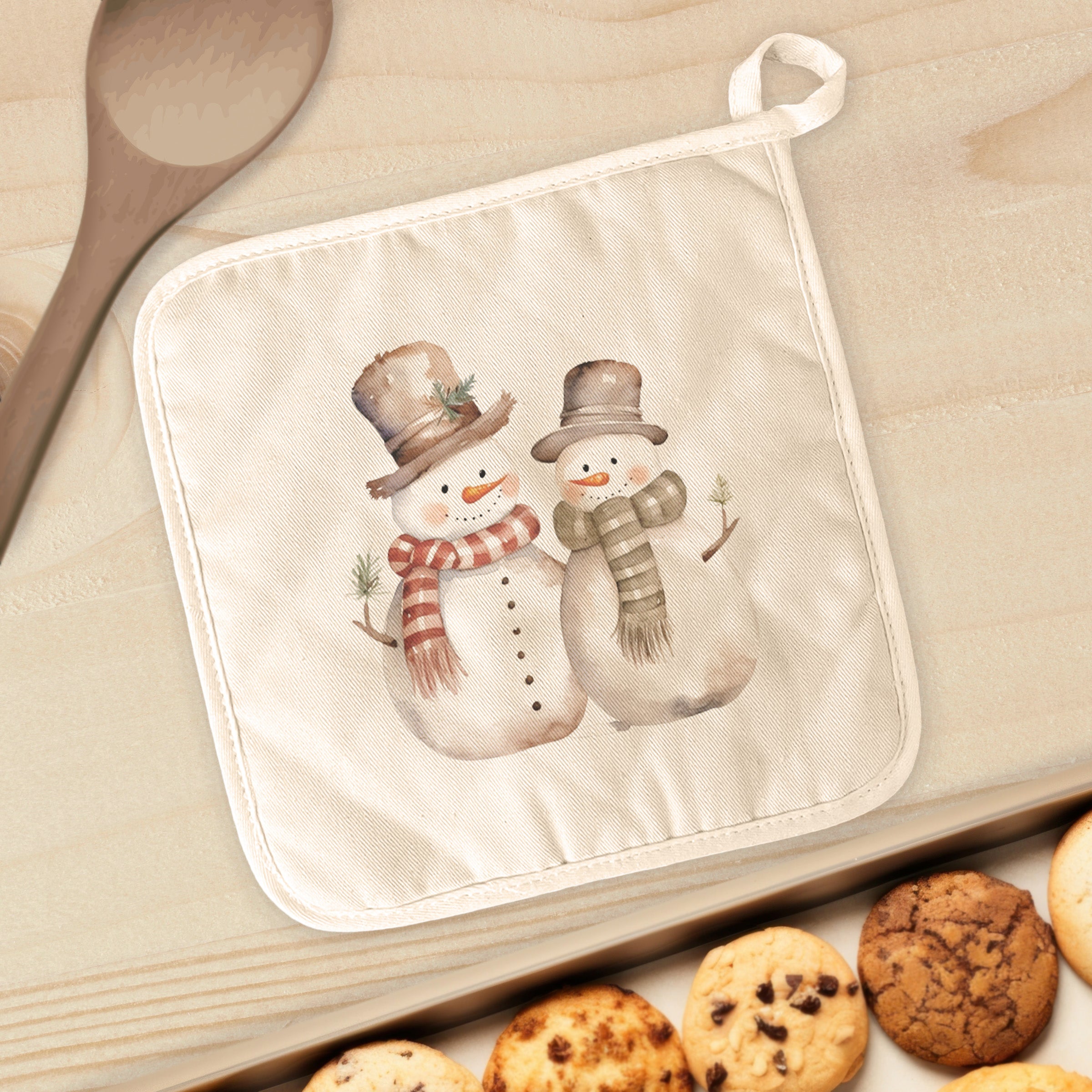 Two Snowmen Cotton Pot Holder featuring a festive design, made from natural cotton and quilted terry cloth, perfect for protecting surfaces from hot cookware.