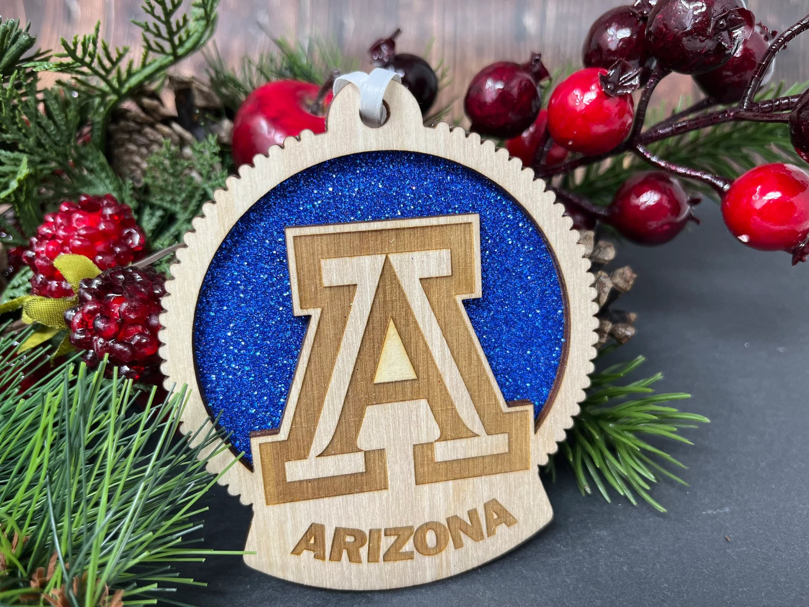 Handmade University of Arizona Ornament made from birch wood, measuring 4x4 inches, elegantly packaged in a cotton-filled box.