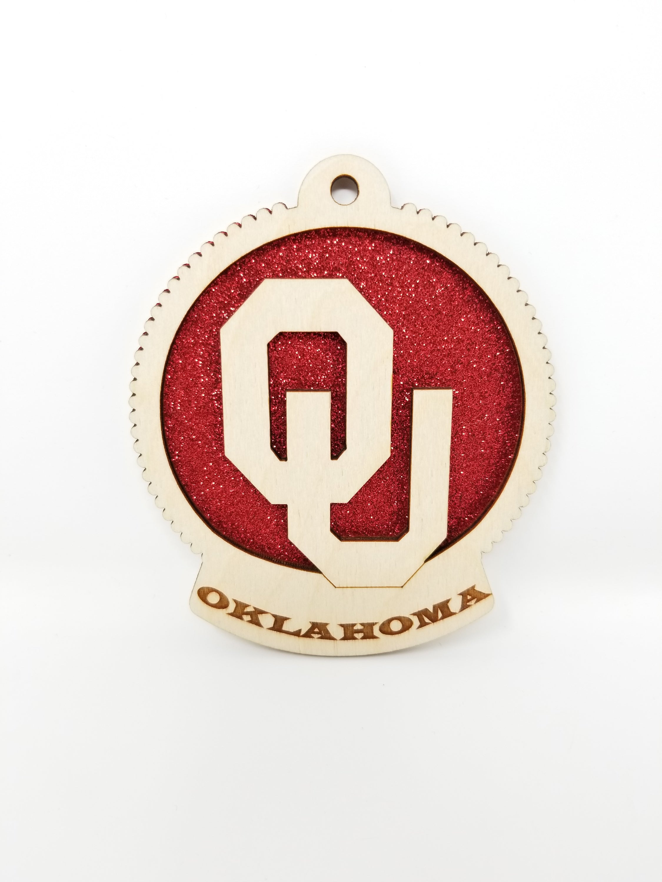 Handmade University of Oklahoma Ornament made from birch wood, measuring 4 inches by 4 inches, elegantly packaged in a cotton-filled box.