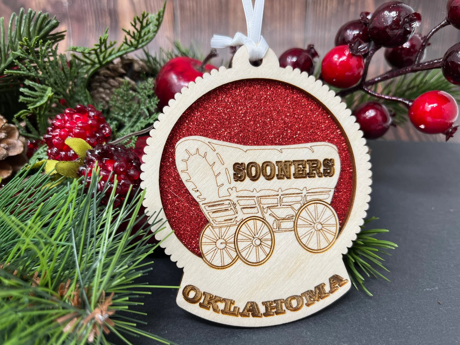 Handmade University of Oklahoma Sooners Ornament made of birch wood, measuring 4x4 inches, elegantly packaged in a cotton-filled box.