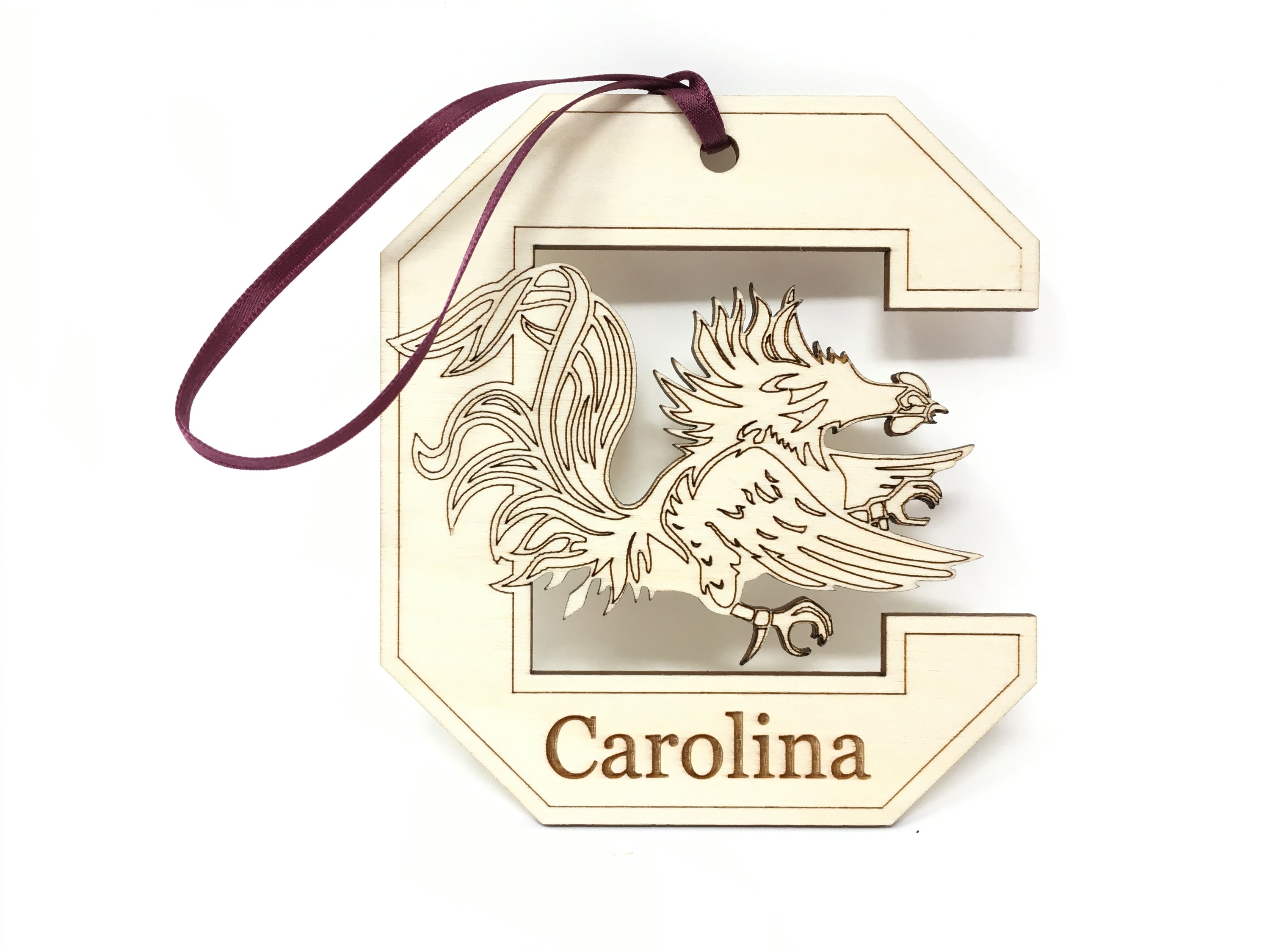 Handcrafted University of South Carolina ornament made from sustainable birch wood, featuring the USC Gamecock logo, perfect for holiday decor.