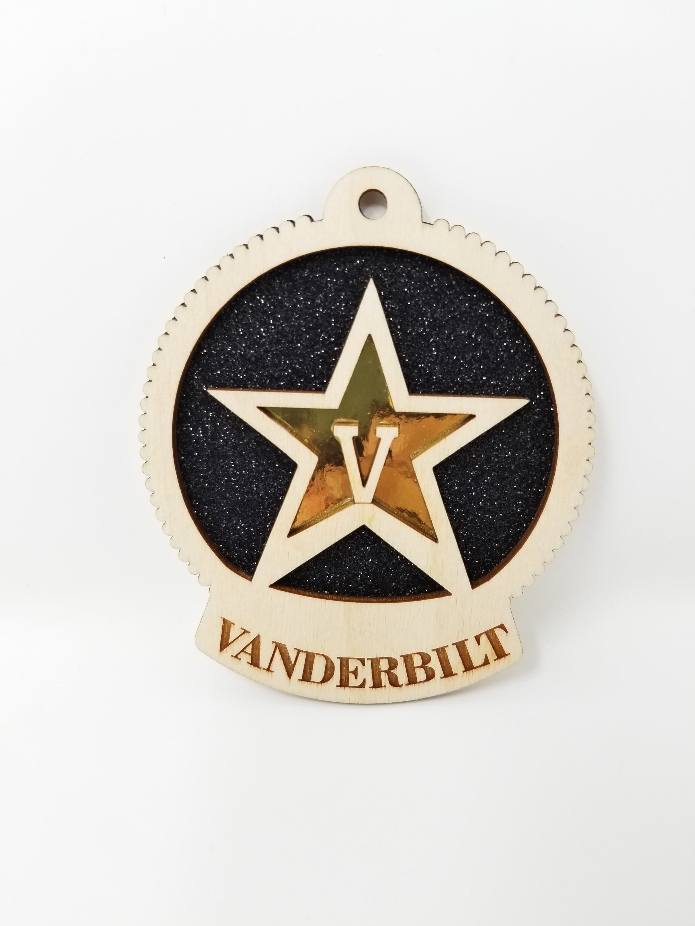 Handcrafted Vanderbilt University ornament made of birch wood, measuring 4x4 inches, elegantly packaged in a cotton-filled box.