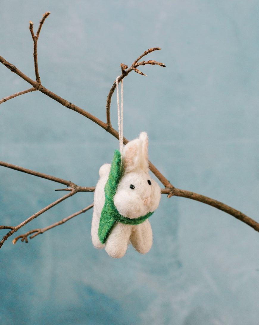 Handcrafted Winter Bunny Felt Ornament made from wool, featuring vibrant colors and intricate details, perfect for winter decor.