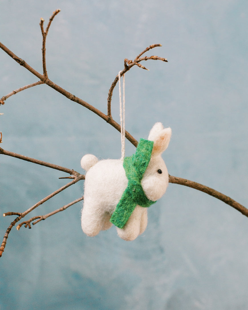 Handcrafted Winter Bunny Felt Ornament made from wool, featuring vibrant colors and intricate details, perfect for winter decor.