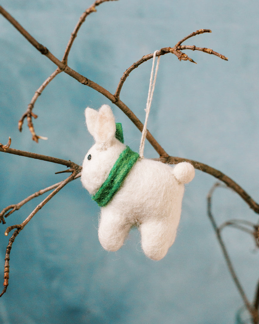 Handcrafted Winter Bunny Felt Ornament made from wool, featuring vibrant colors and intricate details, perfect for winter decor.