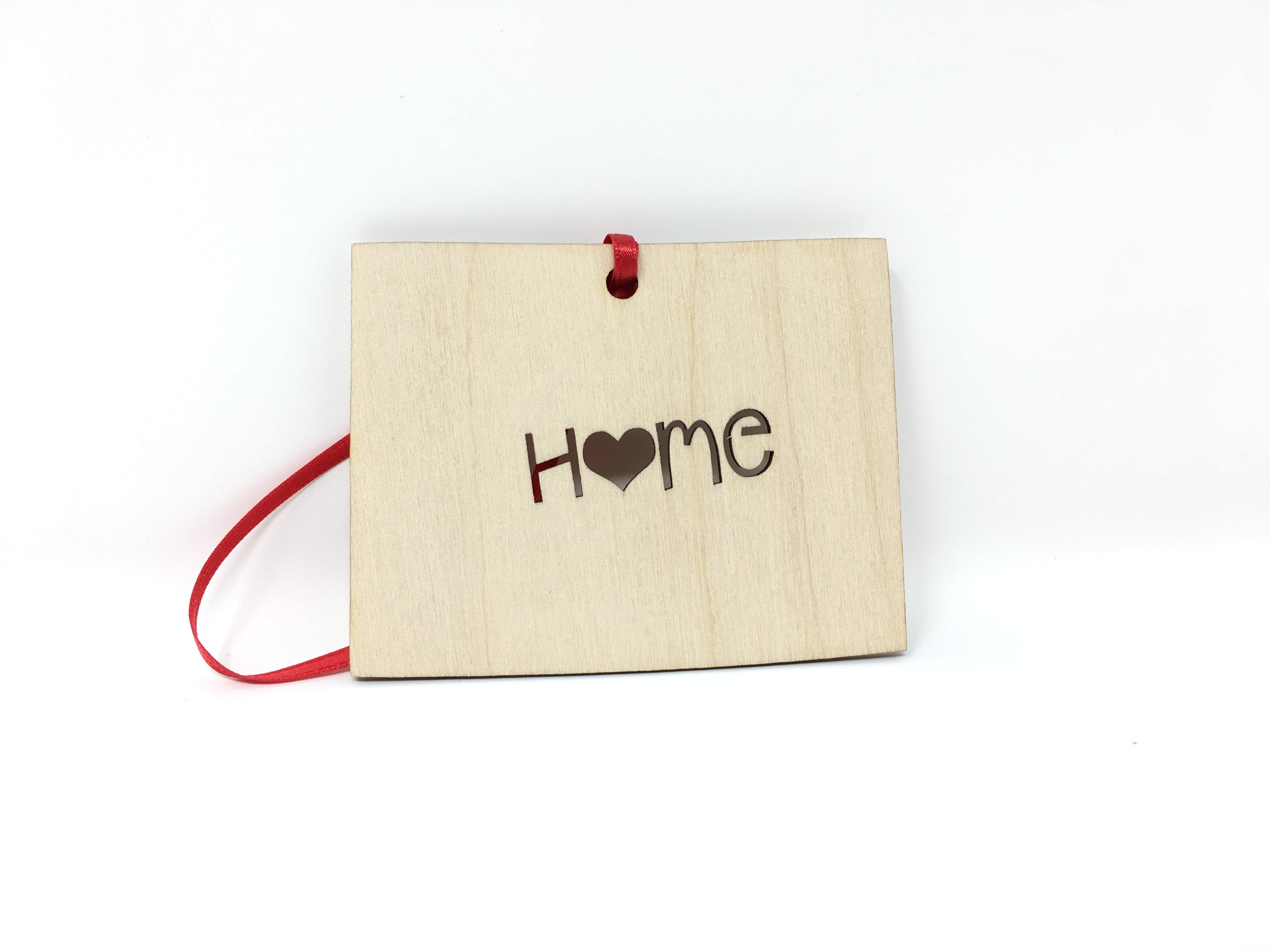 Wyoming State Wood Christmas Ornament made of Baltic Birch, featuring the word 'Home' in a rustic design.