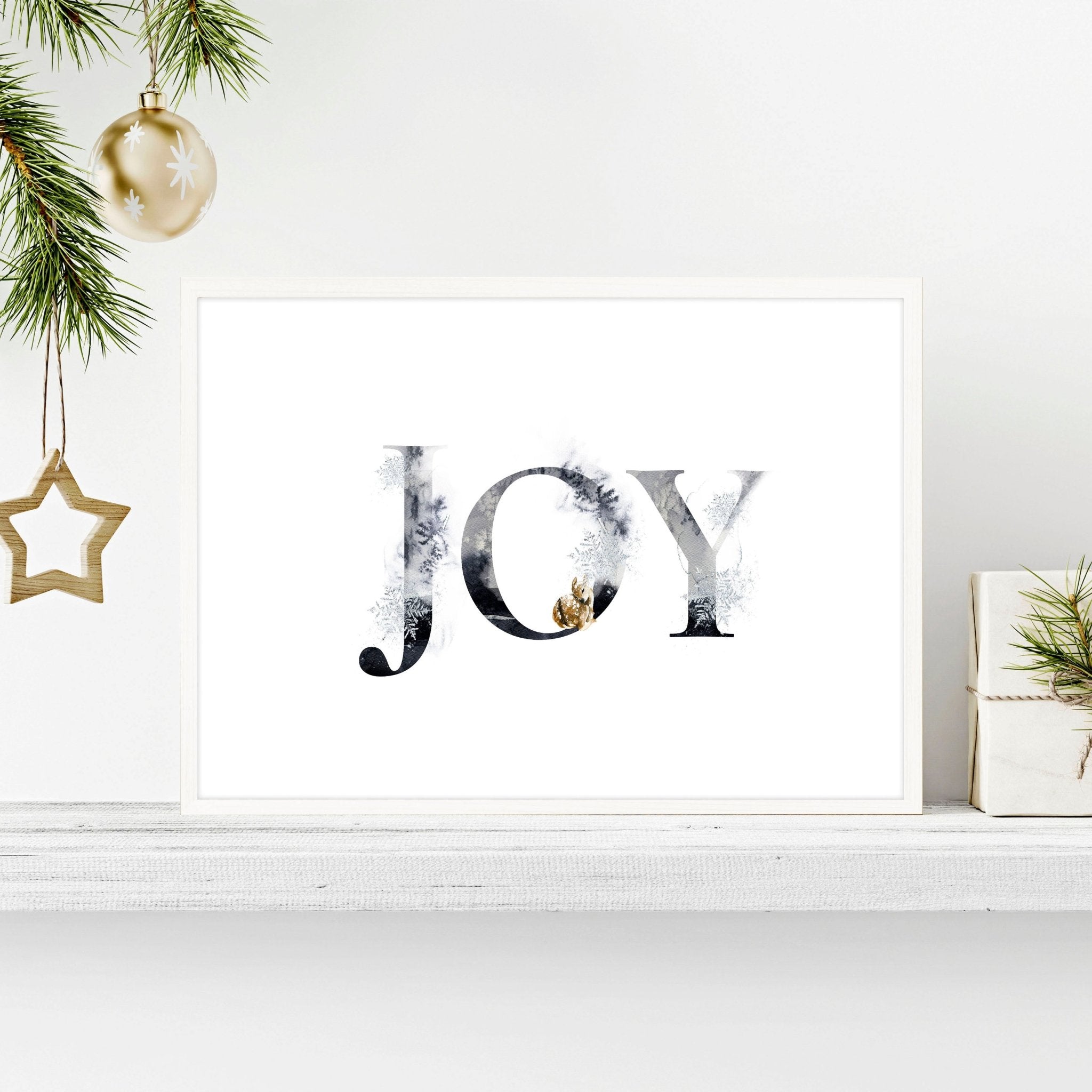 Joy wall art print featuring elegant grayscale design with golden Christmas elements, perfect for festive decor.