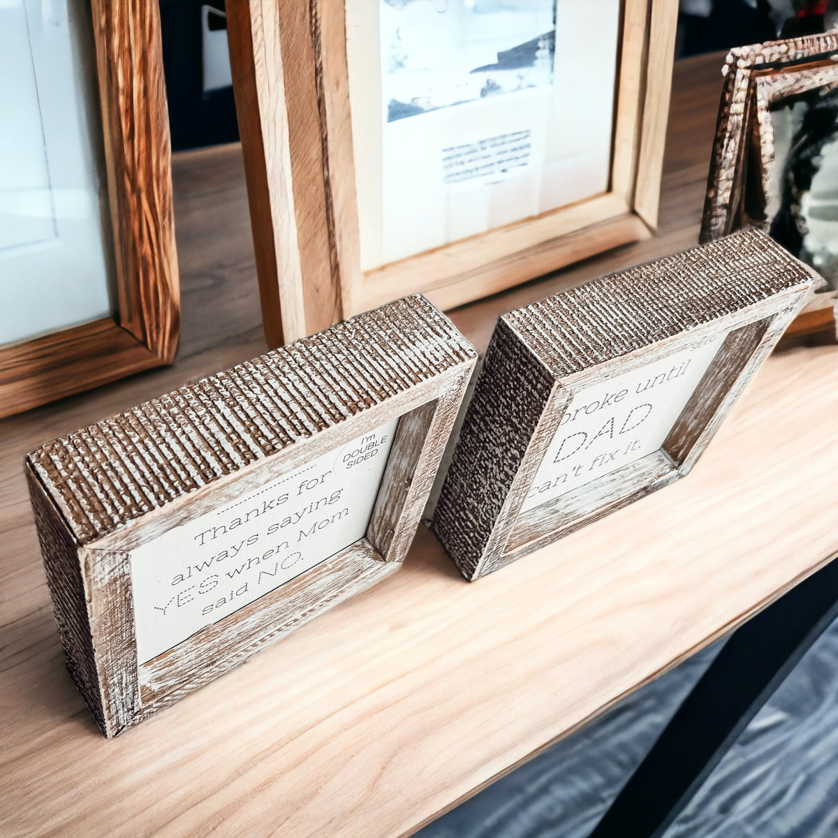 Double-sided wooden sign featuring humorous and heartfelt messages for dads, framed in rustic white wash.