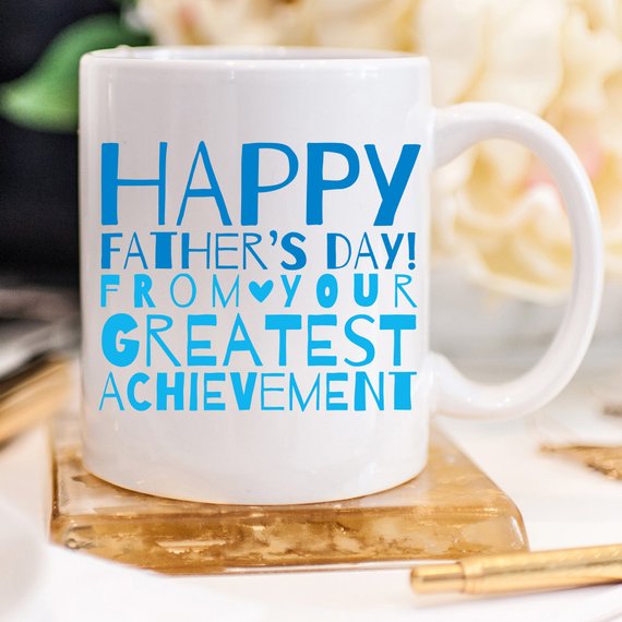 A white ceramic mug featuring a funny design, perfect for Father's Day gifts, showcasing vibrant colors and printed on both sides.