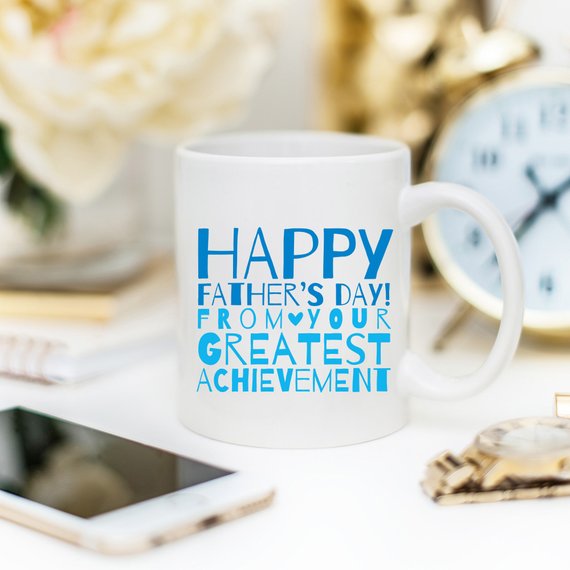 A white ceramic mug featuring a funny design, perfect for Father's Day gifts, showcasing vibrant colors and printed on both sides.