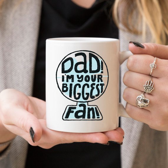 A high-quality white ceramic mug with a funny design, perfect for Father's Day gifts, showcasing vibrant colors and printed on both sides.