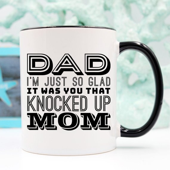 A white ceramic mug featuring a funny design, perfect for Father's Day gifts, showcasing vibrant colors and a durable finish.