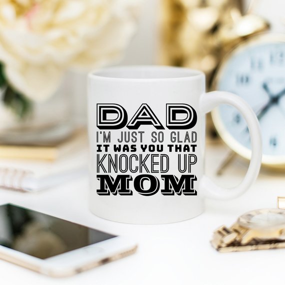 A white ceramic mug featuring a funny design, perfect for Father's Day gifts, showcasing vibrant colors and a durable finish.