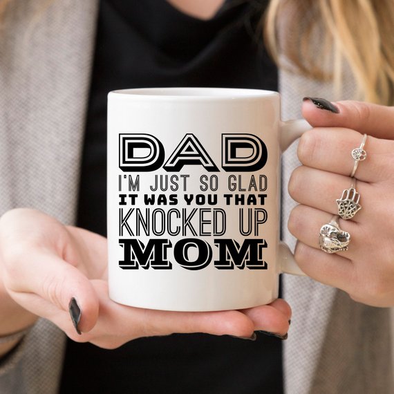 A white ceramic mug featuring a funny design, perfect for Father's Day gifts, showcasing vibrant colors and a durable finish.