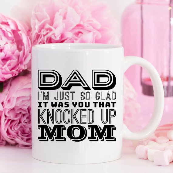 A white ceramic mug featuring a funny design, perfect for Father's Day gifts, showcasing vibrant colors and a durable finish.