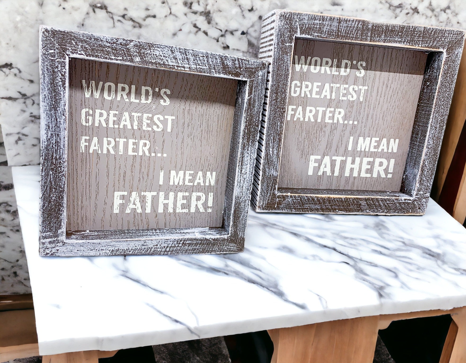 Handmade wooden sign reading 'World's Greatest Farter...I Mean Father' in distressed gray and white colors.