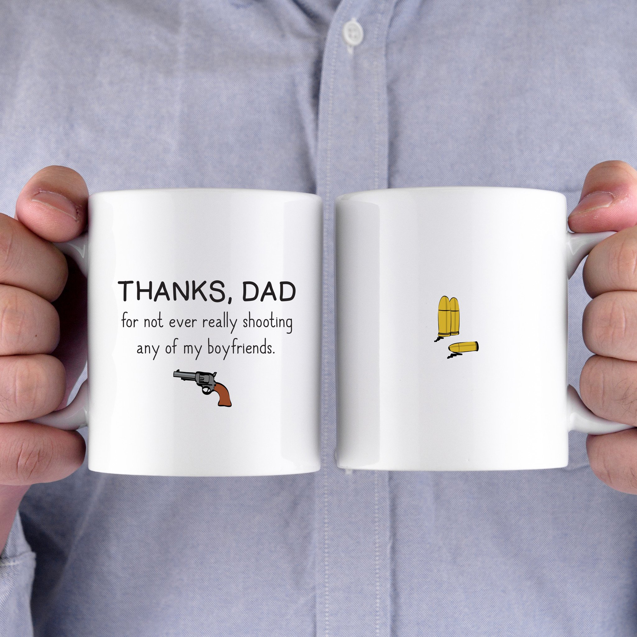 Ceramic mug with humorous text for dads, featuring a classic shape and large C-shaped handle, suitable for hot and cold beverages.