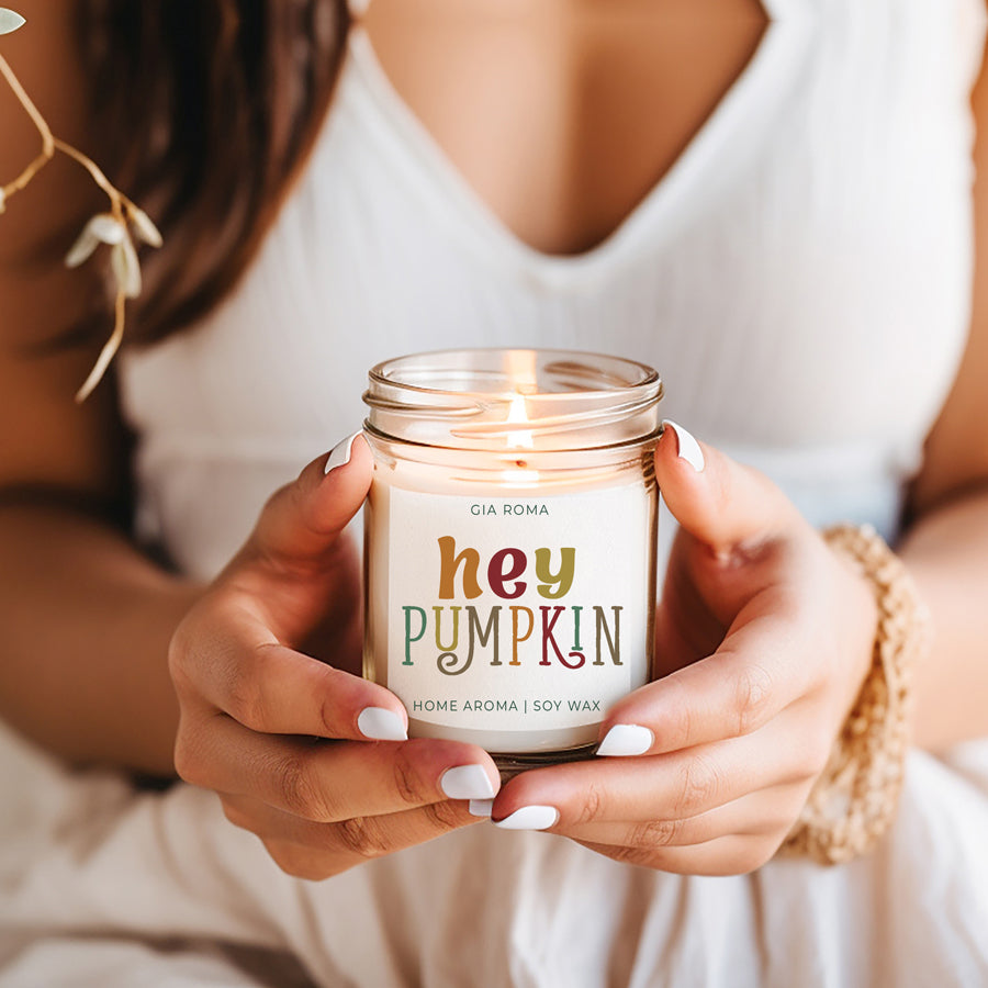 Baked Pumpkin Candle with a gold lid, showcasing a warm pumpkin pie scent and a cozy autumn ambiance.