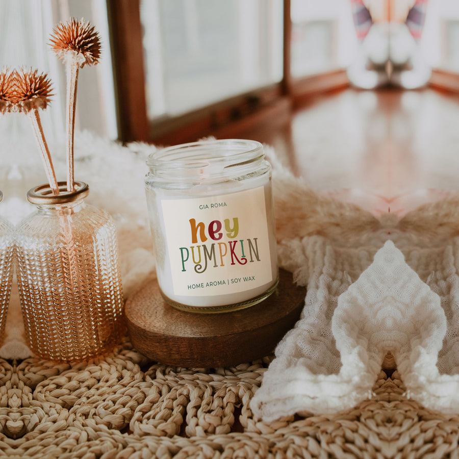 Baked Pumpkin Candle with a gold lid, showcasing a warm pumpkin pie scent and a cozy autumn ambiance.