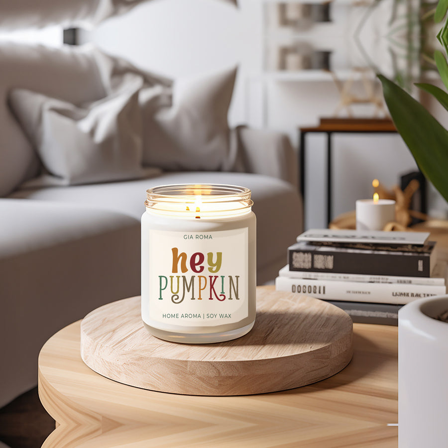 Baked Pumpkin Candle with a gold lid, showcasing a warm pumpkin pie scent and a cozy autumn ambiance.