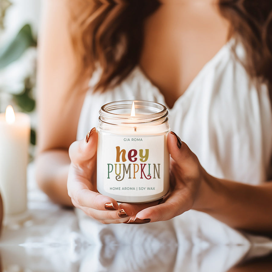 Baked Pumpkin Candle with a gold lid, showcasing a warm pumpkin pie scent and a cozy autumn ambiance.