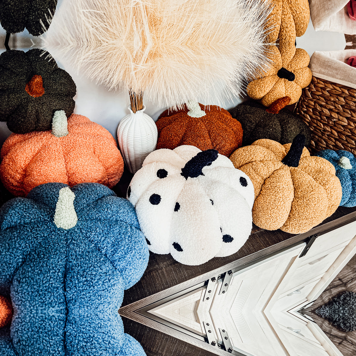 A plush Blair Pumpkin II in vibrant colors, showcasing its soft teddy velvet fabric and charming design, perfect for fall decor.