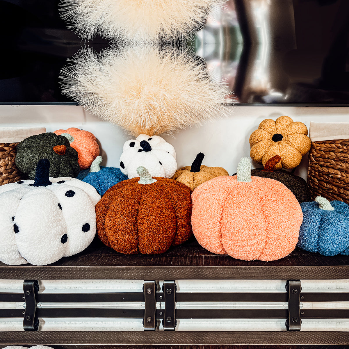 A plush Blair Pumpkin II in vibrant colors, showcasing its soft teddy velvet fabric and charming design, perfect for fall decor.