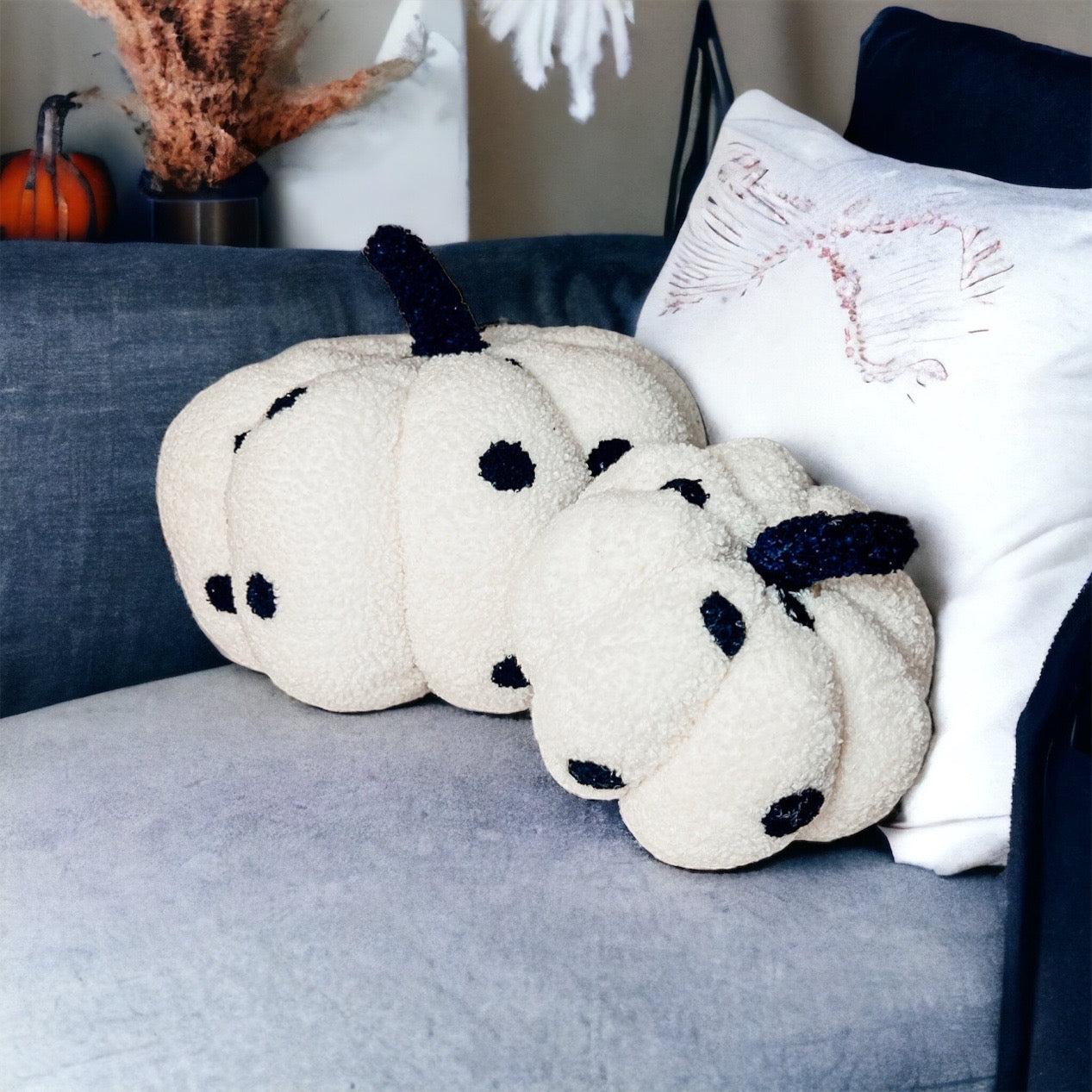 A plush Blair Pumpkin II in vibrant colors, showcasing its soft teddy velvet fabric and charming design, perfect for fall decor.