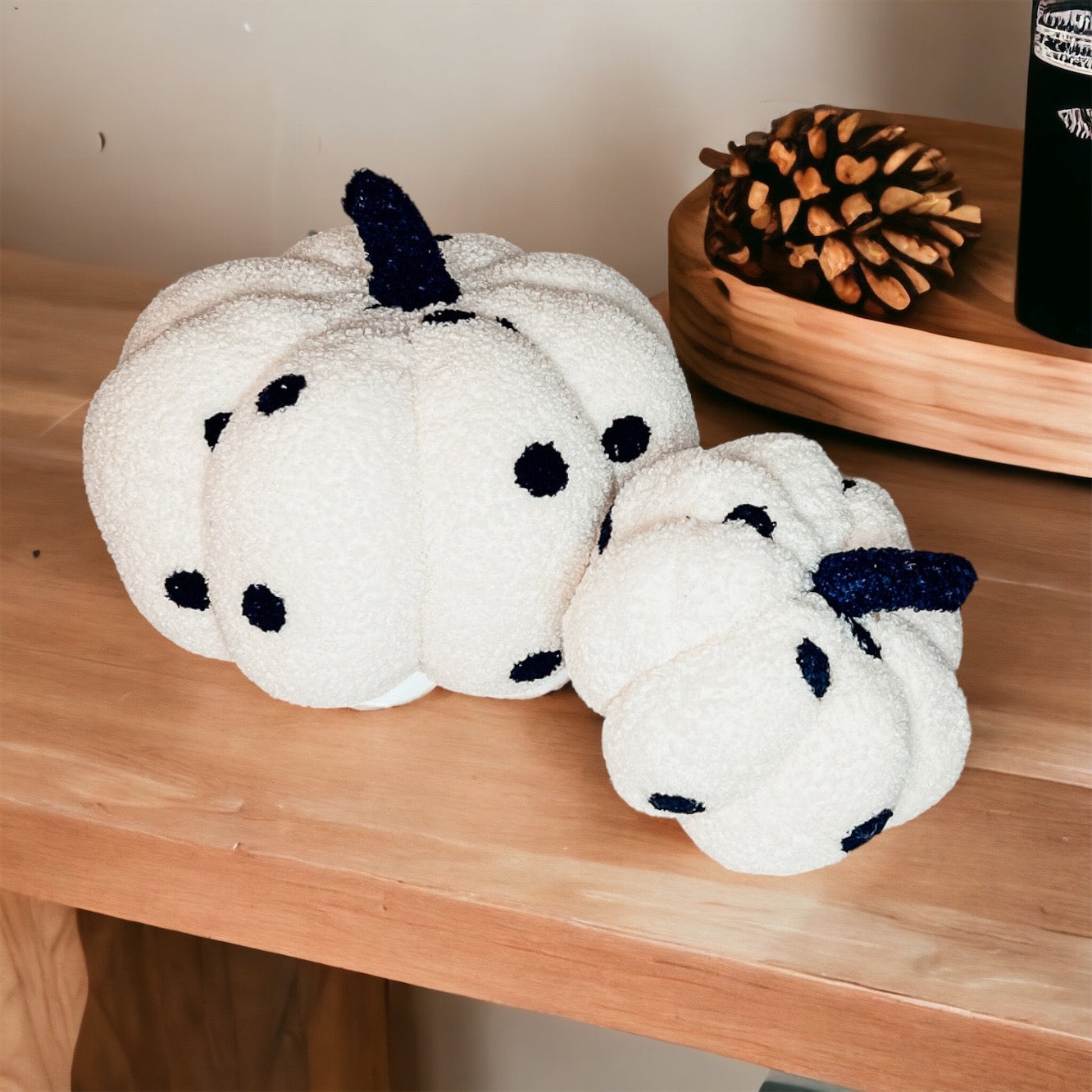 A plush Blair Pumpkin II in vibrant colors, showcasing its soft teddy velvet fabric and charming design, perfect for fall decor.