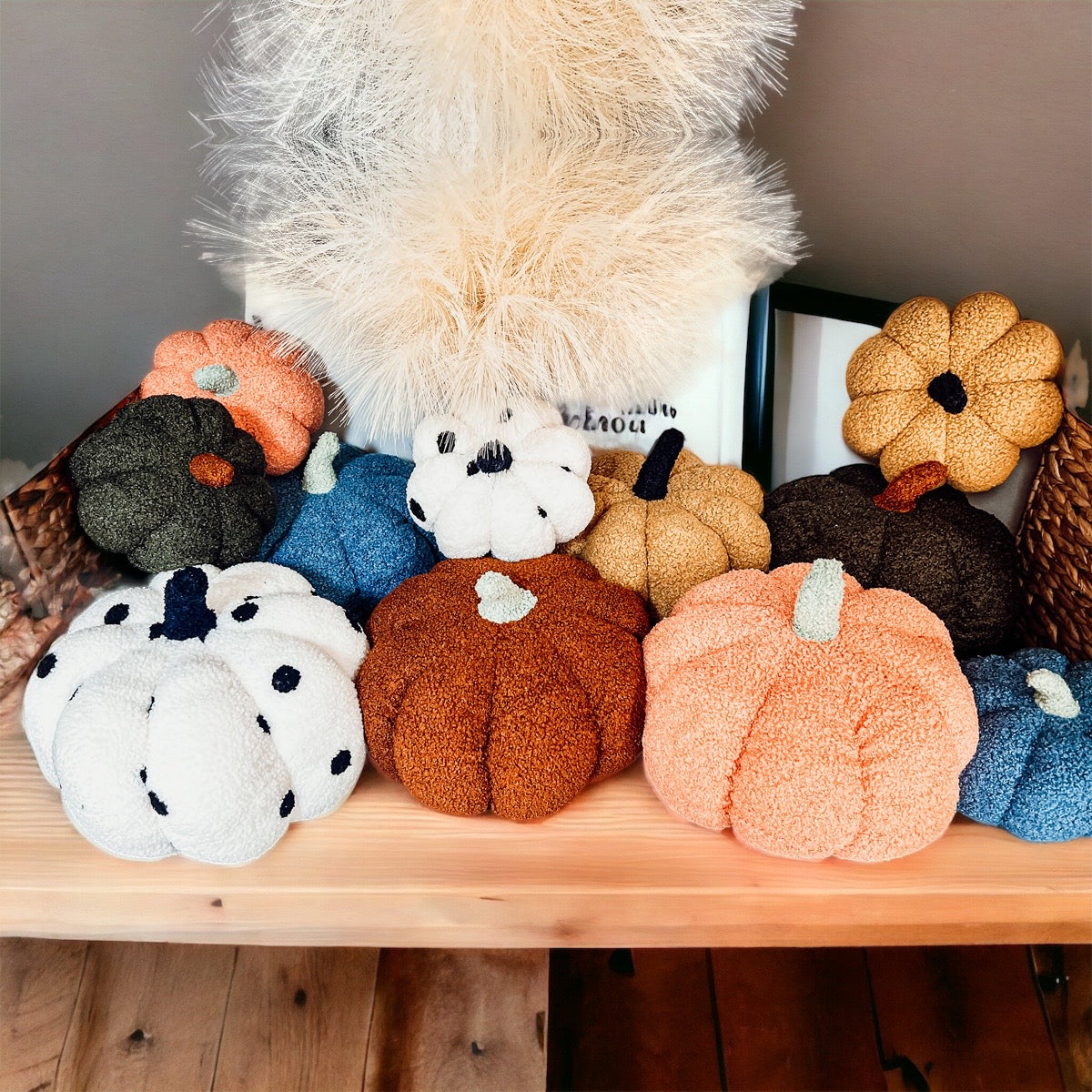 A plush Blair Pumpkin II in vibrant colors, showcasing its soft teddy velvet fabric and charming design, perfect for fall decor.