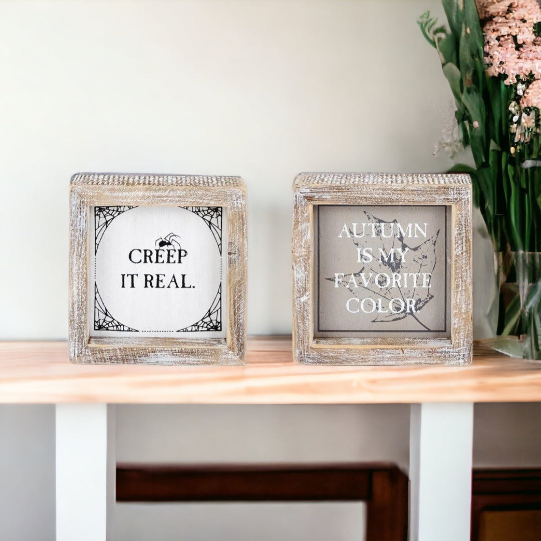 Creep + Autumn double-sided wooden sign featuring 'Creep it real' and 'Autumn is my favorite color' designs, perfect for seasonal decor.