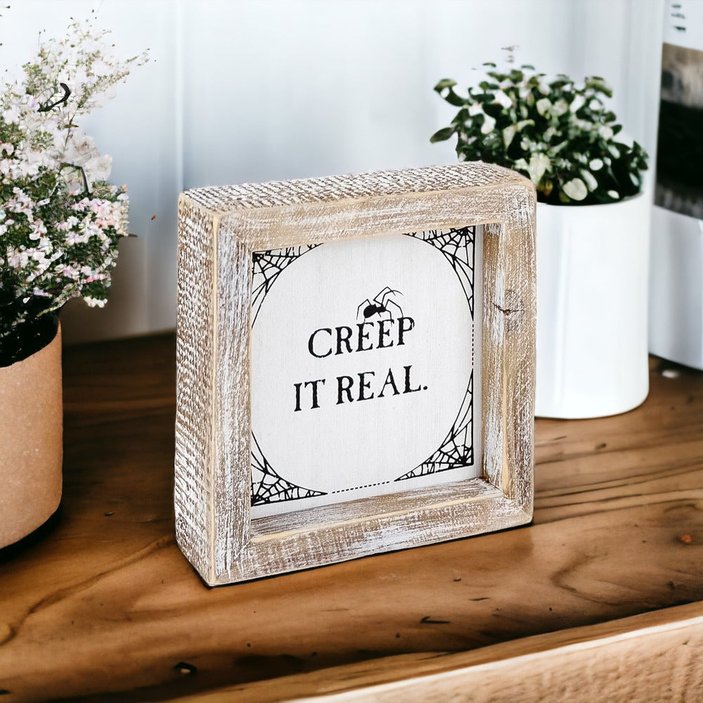 Creep + Autumn double-sided wooden sign featuring 'Creep it real' and 'Autumn is my favorite color' designs, perfect for seasonal decor.