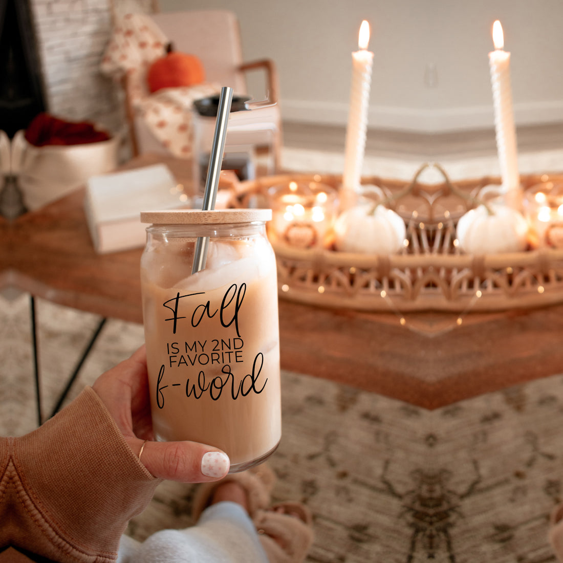 A stylish Fall F-Word Cup made of high borosilicate glass with a bamboo lid, featuring a black graphic text that reads 'FALL IS MY 2ND FAVORITE F-WORD', accompanied by stainless steel straws.